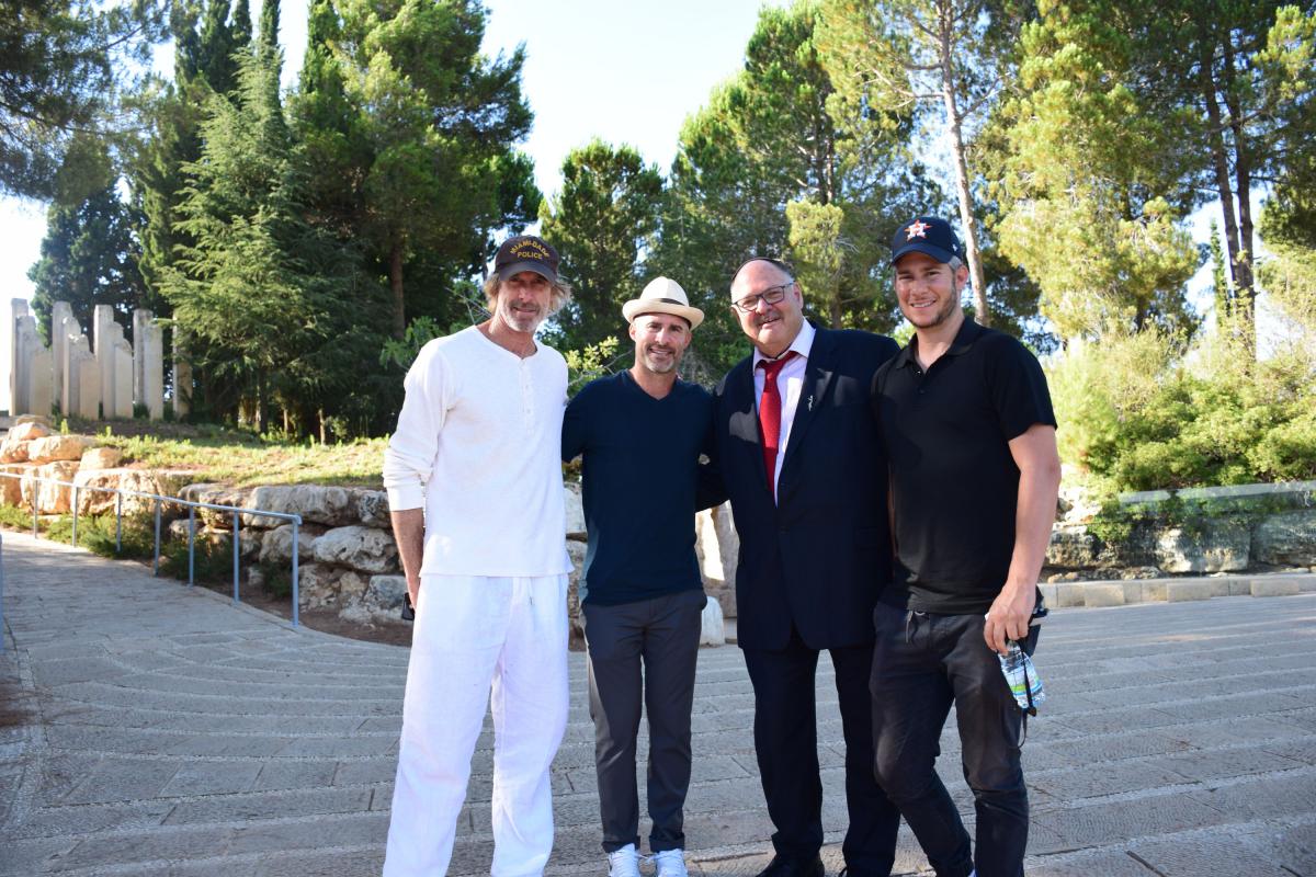 Brothers David and Andy Resnick (second from left and right) toured Yad Vashem on 24 July, accompanied by their friend and noted filmmaker Michael Bay (left) and Shaya Ben Yehuda (second from right).